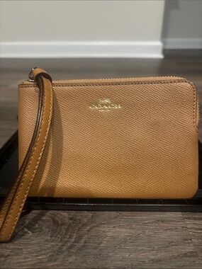 Coach Tan Pebbled Leather Wristlet with Gold Logo